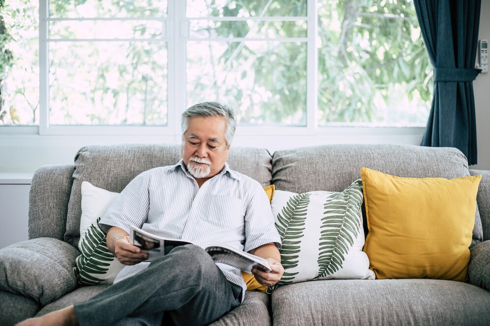 Home is Where the Heart Thrives: Senior man sitting at home