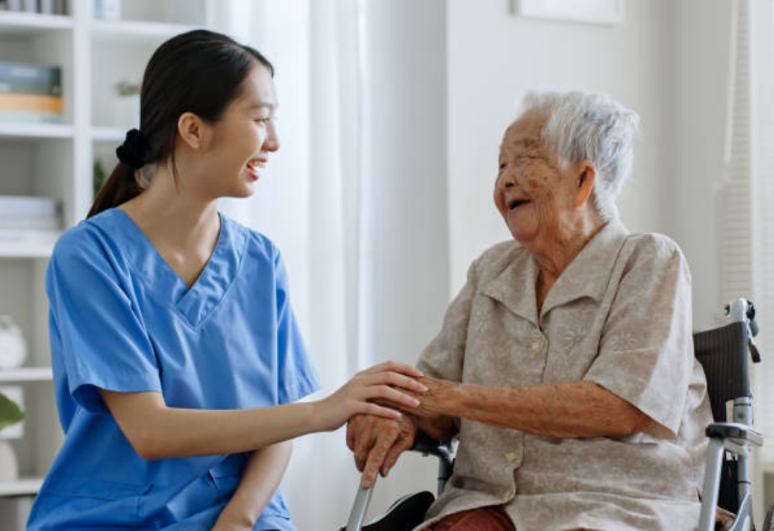 Nurse with Senior in Wheelchair depicting aging in place