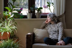 woman at home concentrating on ethical principles