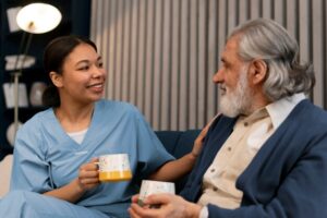 nurse sitting with dementia patient