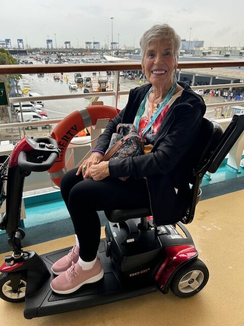 Traveling Elderly Woman in Wheelchair